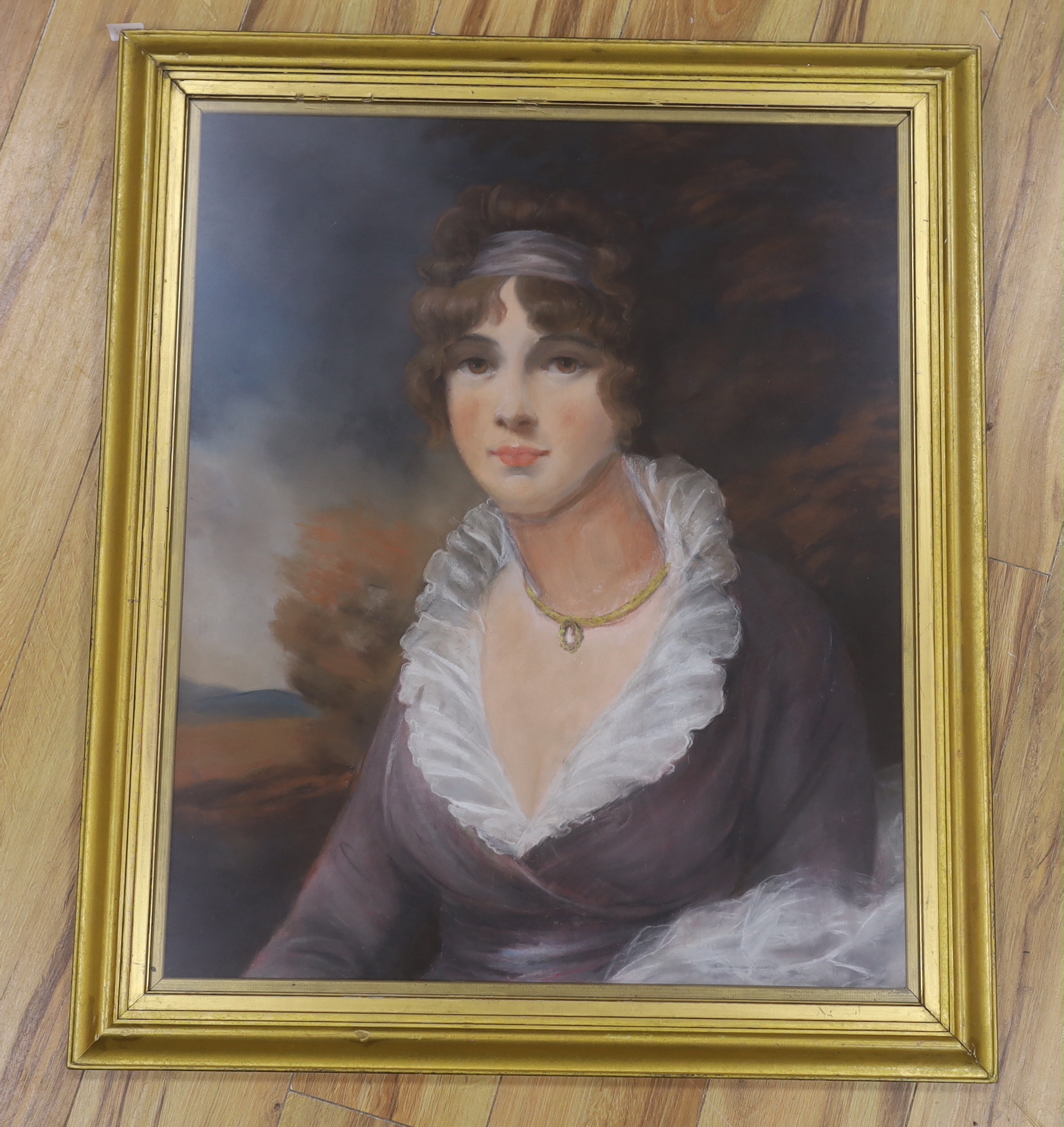 Style of Thomas Gainsborough (1727-1788) , pastel, Portrait of a lady before a landscape, 72 x 58cm